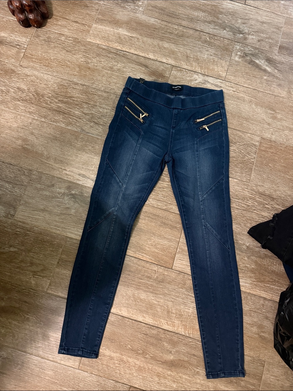 bebe Dark Blue Skinny Jeggings with Gold Zipper Accents  stretch waist band